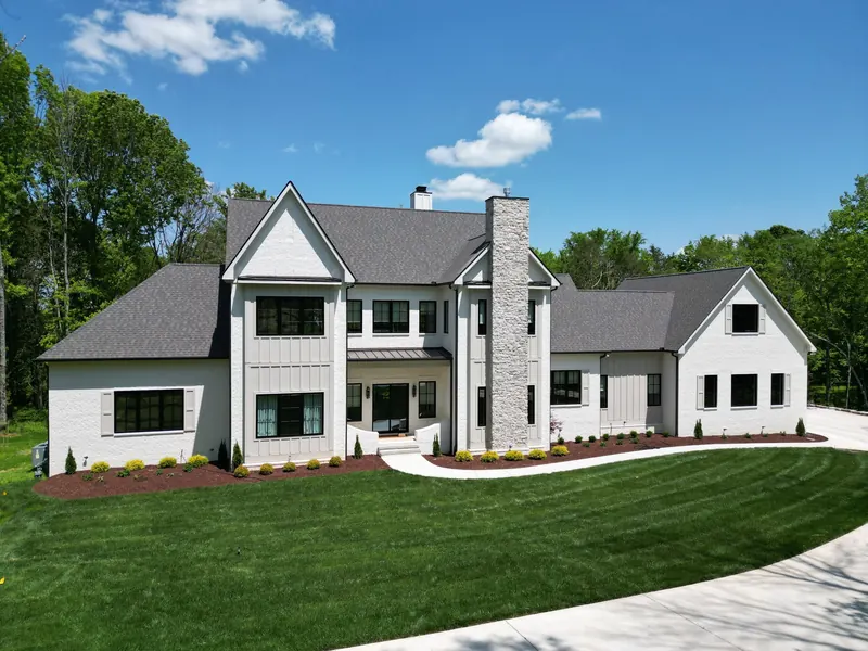 Custom home, pool and landscaped backyard built by Outback Construction