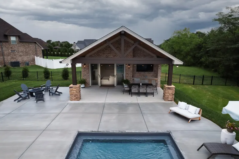 Pool and covered outdoor kitchen built by Outback Construction in Lebanon, Tennessee